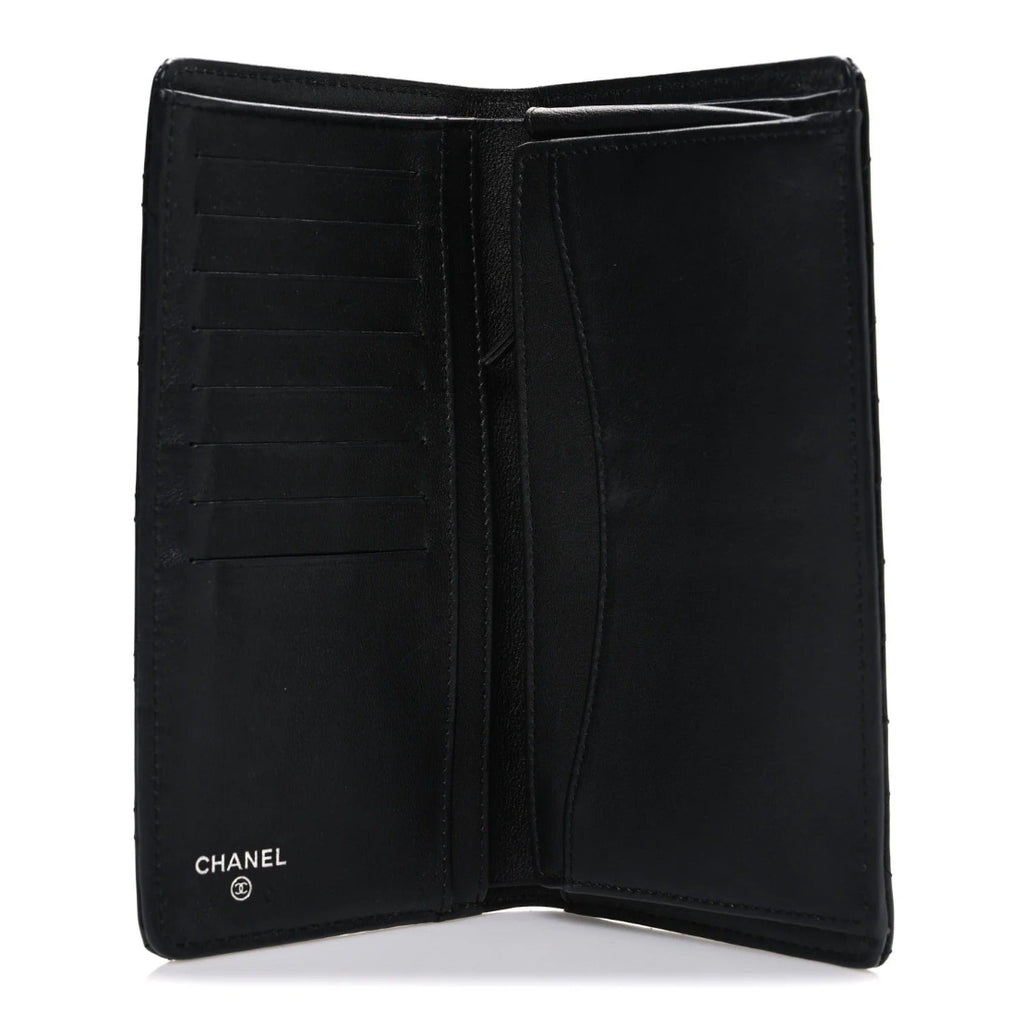 Black Chanel wallet on a white background