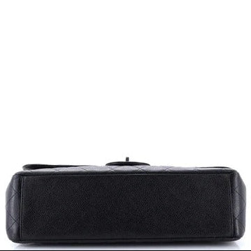 Chanel Classic Double Flap Bag Quilted Caviar Maxi Black handbag on a white background