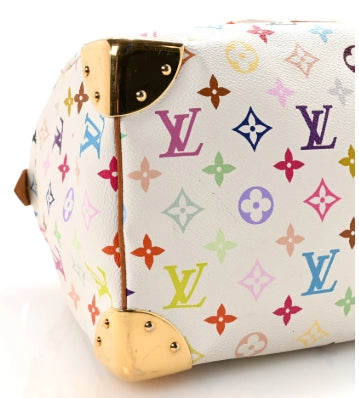 Louis Vuitton monogram multicolor handbag with gold accents on a white background