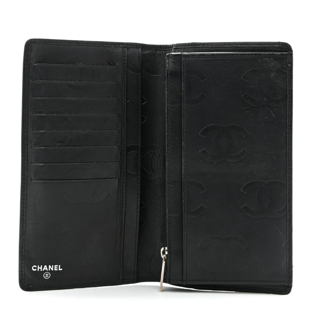 Black Chanel wallet withCC logo on a white background