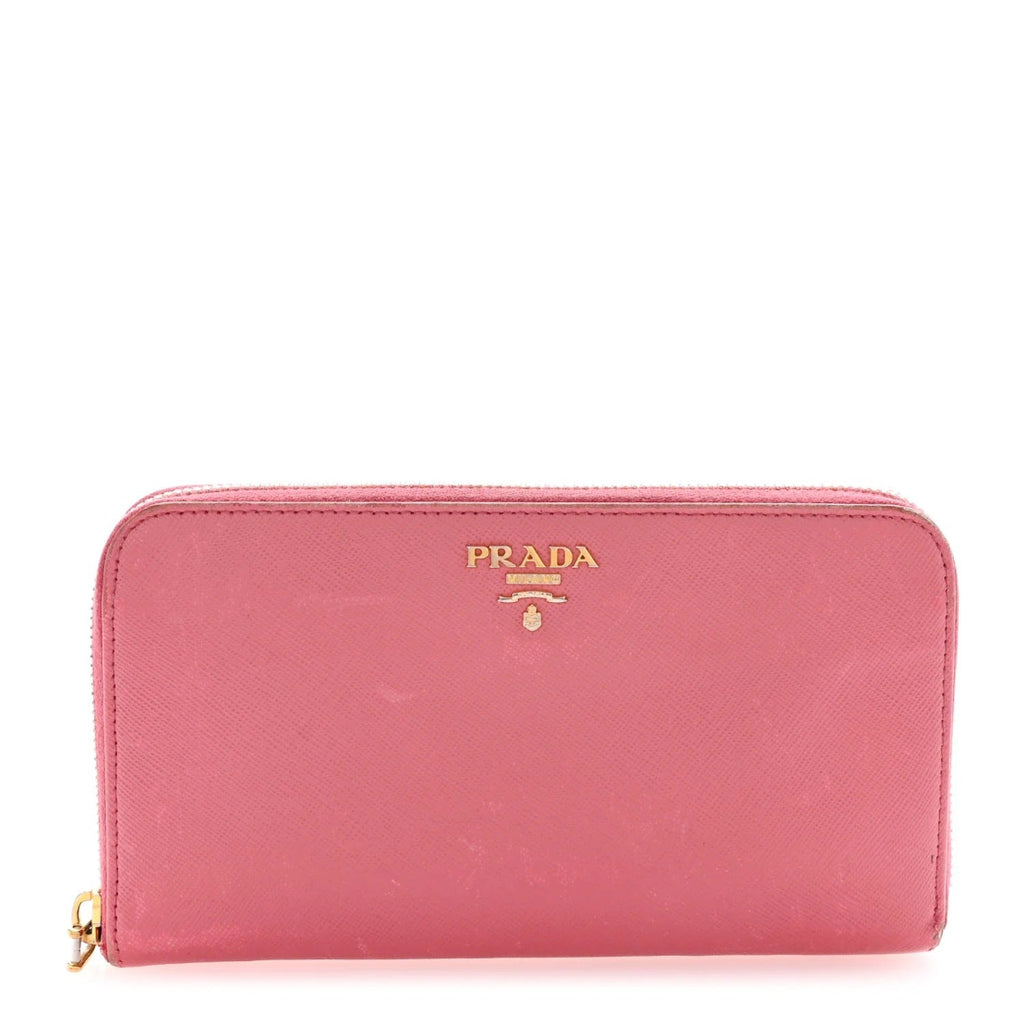 Pink Prada wallet on a white background