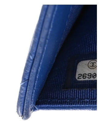 Close-up of a blue fabric with a visible Chanel label.