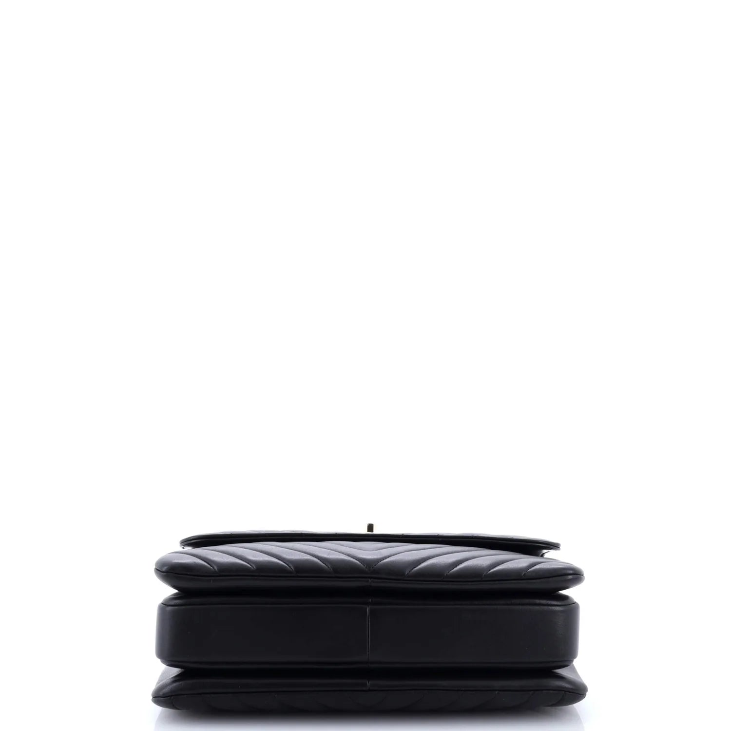 Black quilted classic Chanel leather handbag on a white background