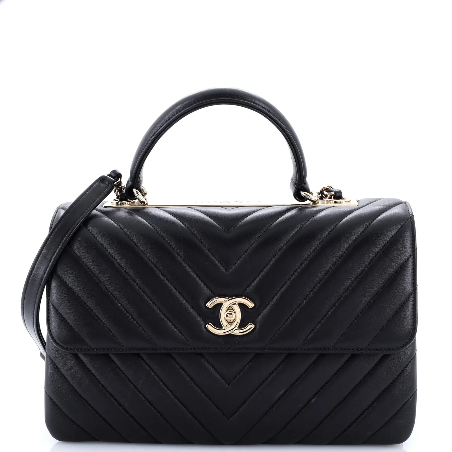 Black quilted classic Chanel leather handbag with gold Chanel logo on a white background
