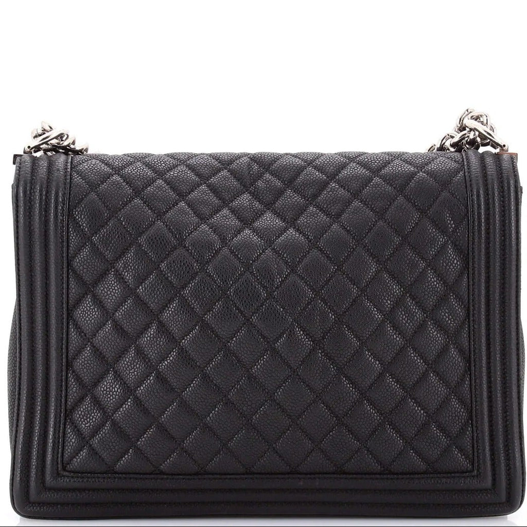 chanel caviar boy flap bag large handbag on a white background