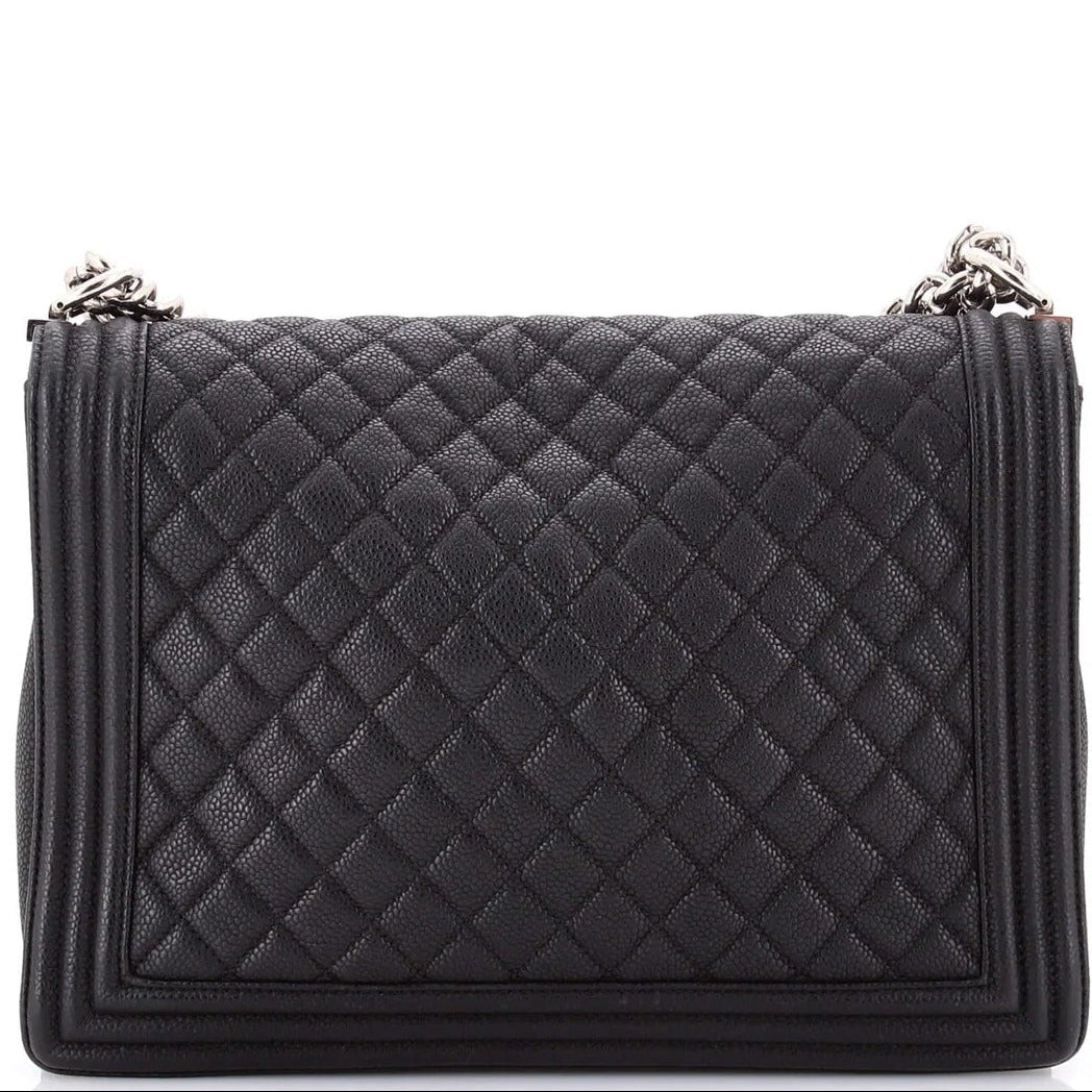 chanel caviar boy flap bag large handbag on a white background