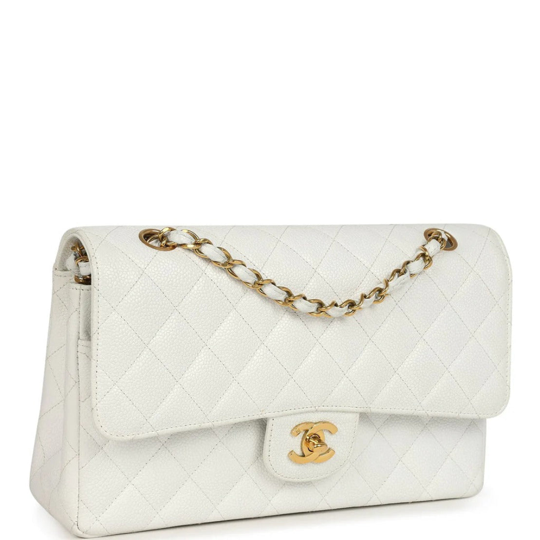 White quilted handbag with gold chain and clasp on a white   chanel caviar white medium double flap background