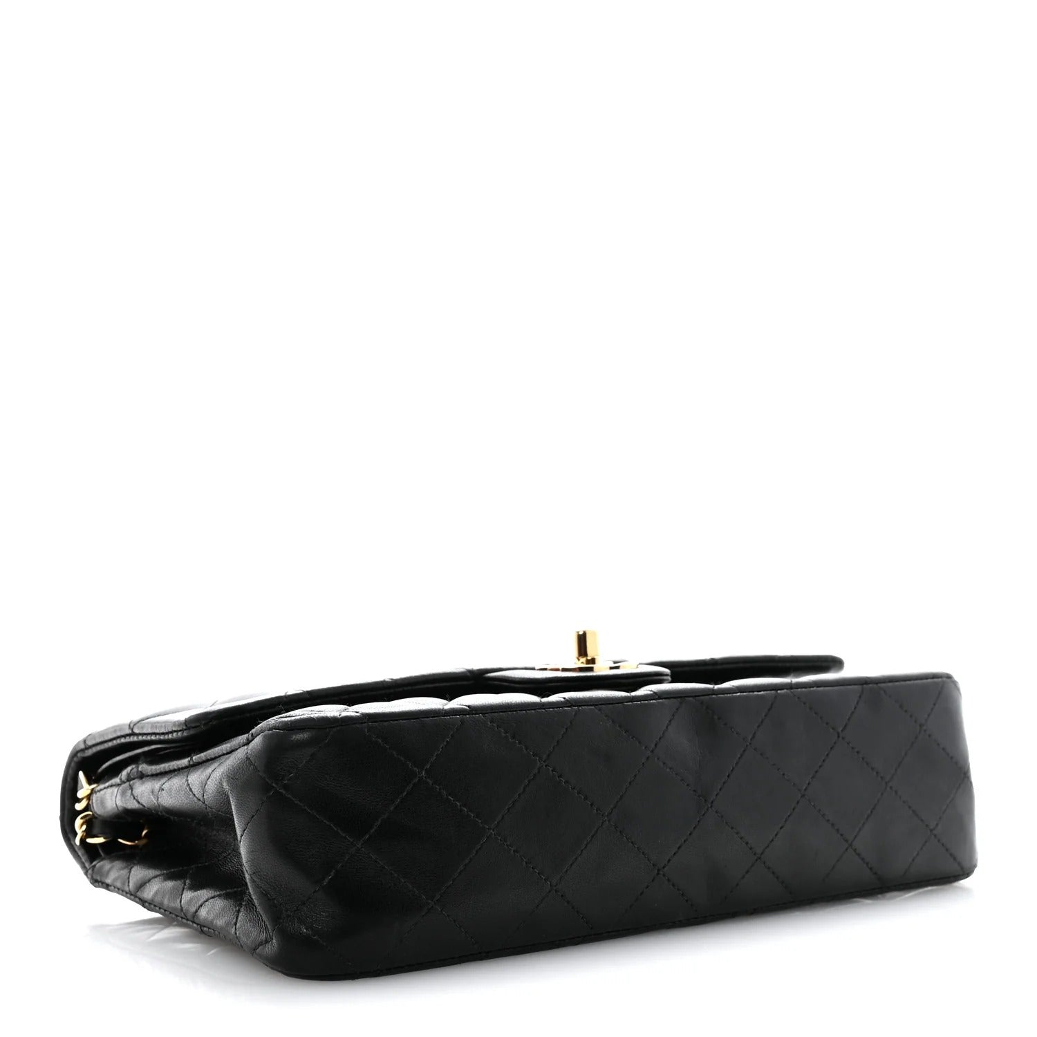 chanel lambskin medium double flap  Black quilted handbag with gold hardware on a white background