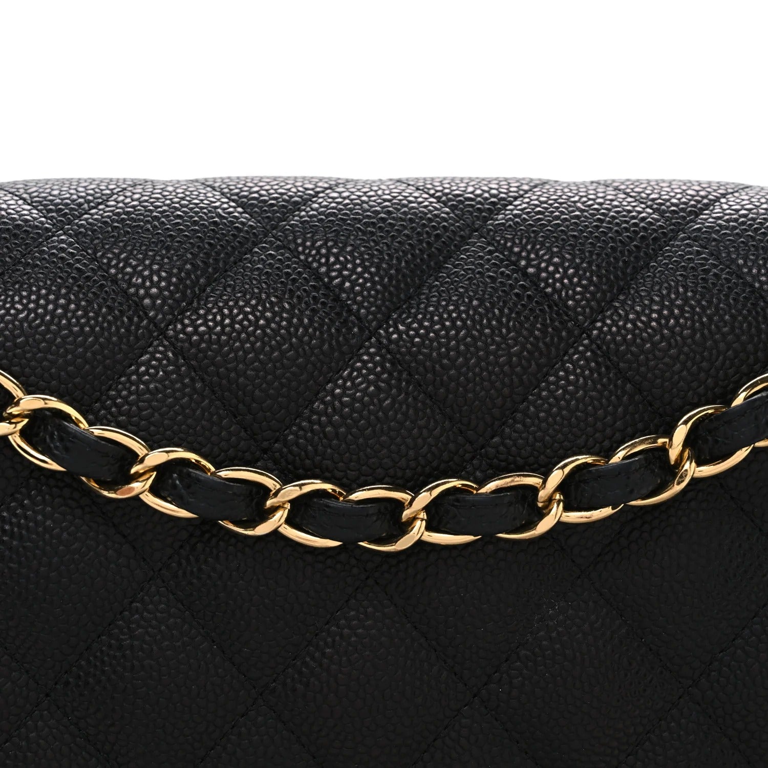 Chanel Classic Double Flap Bag Quilted Caviar Maxi Black quilted handbag with a gold chain strap on a white background