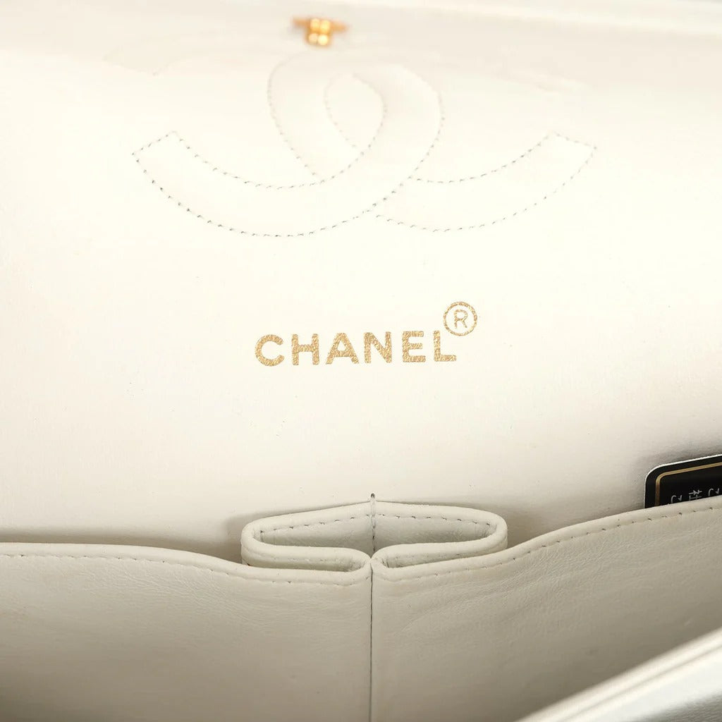 Close-up of a Chanel handbag with the brand logo.