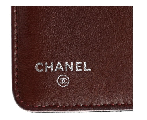 Close-up of a black leather Chanel wallet lambskin  