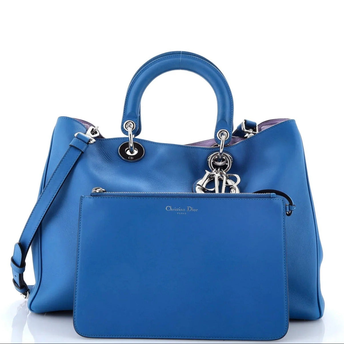 christian dior diorissmo blue tote with a visible brand logo on a white background