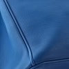 Close-up of a blue fabric texture christian dior diorissmo blue tote