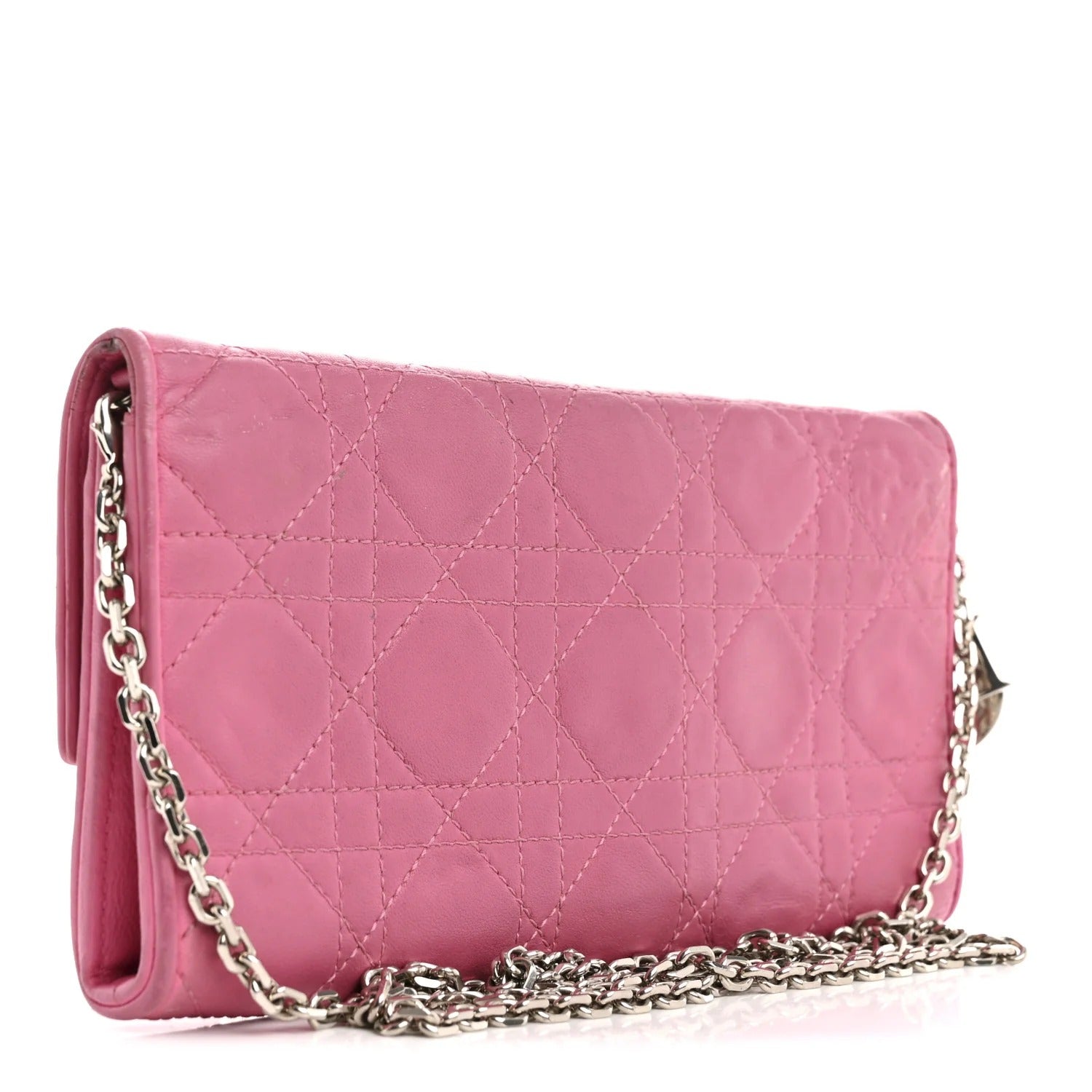 Pink quilted handbag with a chain strap on a white background christian dior wallet on chain 