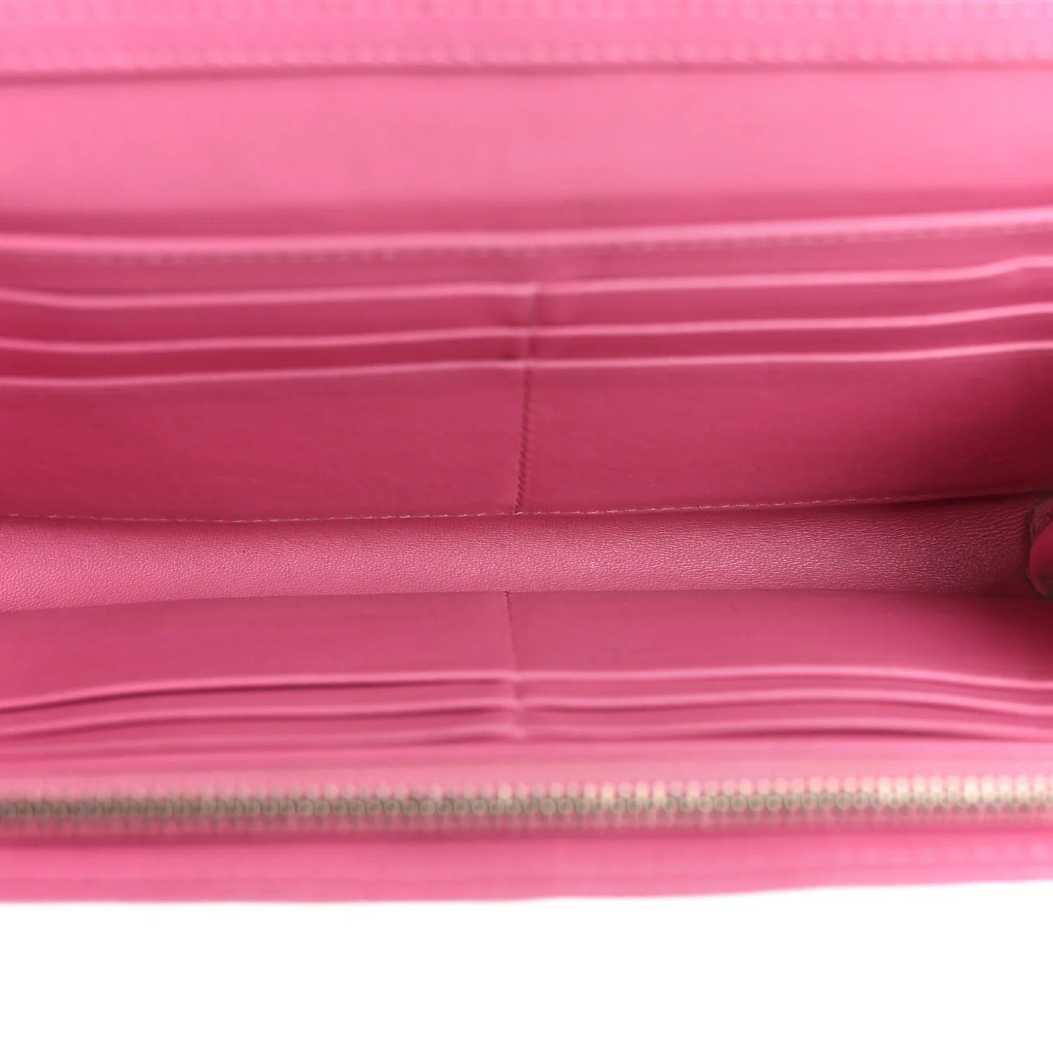 Close-up of a pink bag with a zipper on a white background