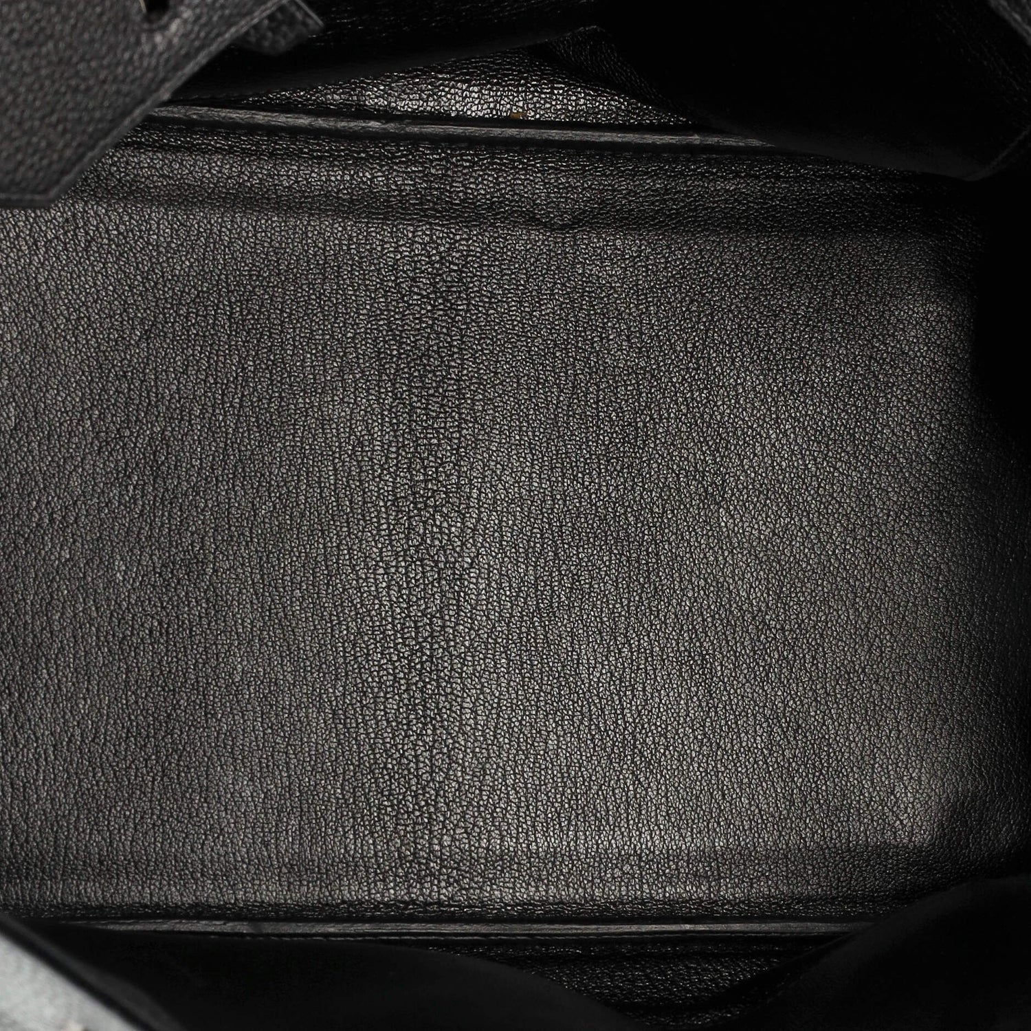 Close-up of a textured black leather Hermes Birkin interior
