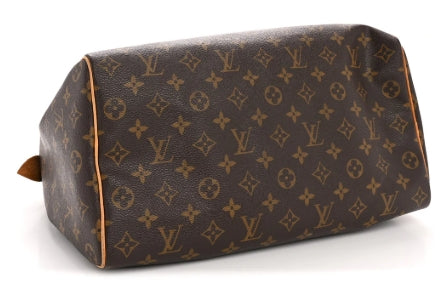 Louis Vuitton monogram bag on a white background