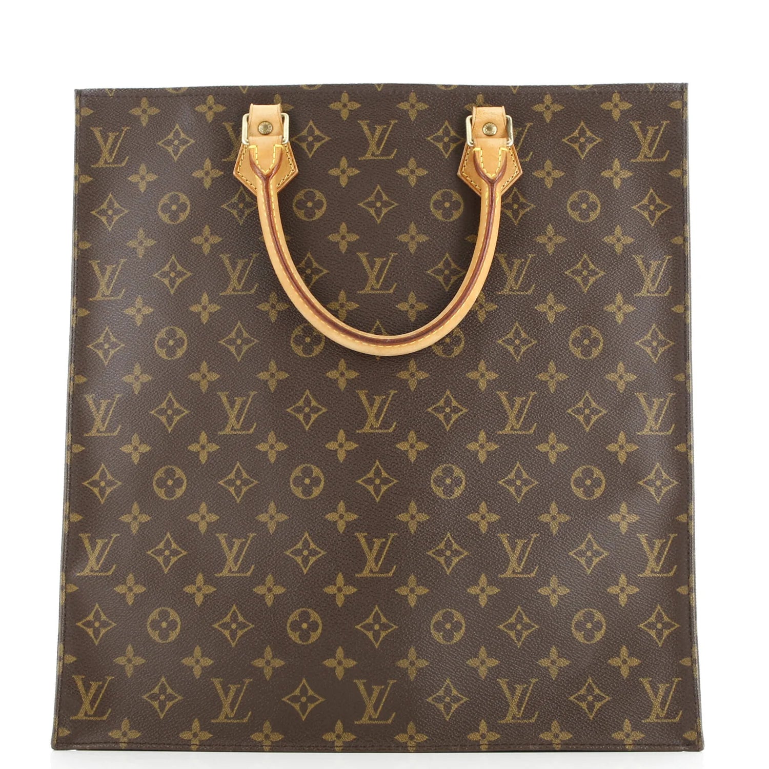 Louis Vuitton monogram shopping bag with gold handles on a white background