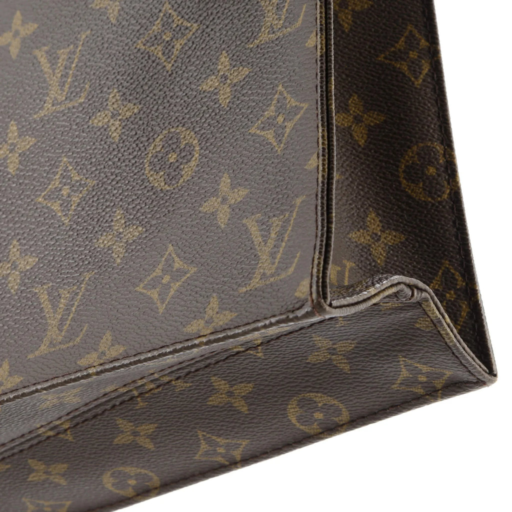 Close-up of a brown leather Louis Vuitton bag with monogram pattern