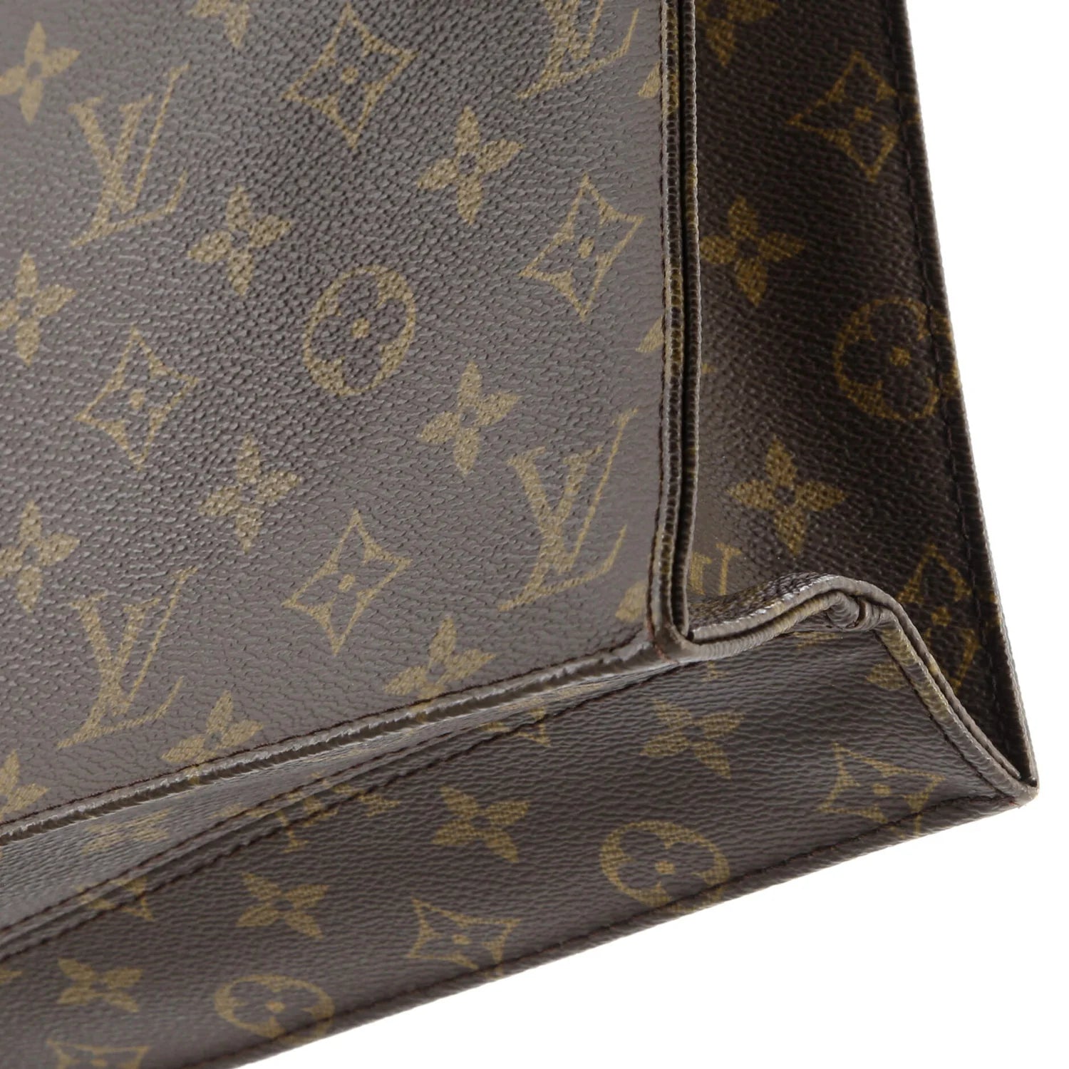 Close-up of a brown leather Louis Vuitton bag with monogram pattern
