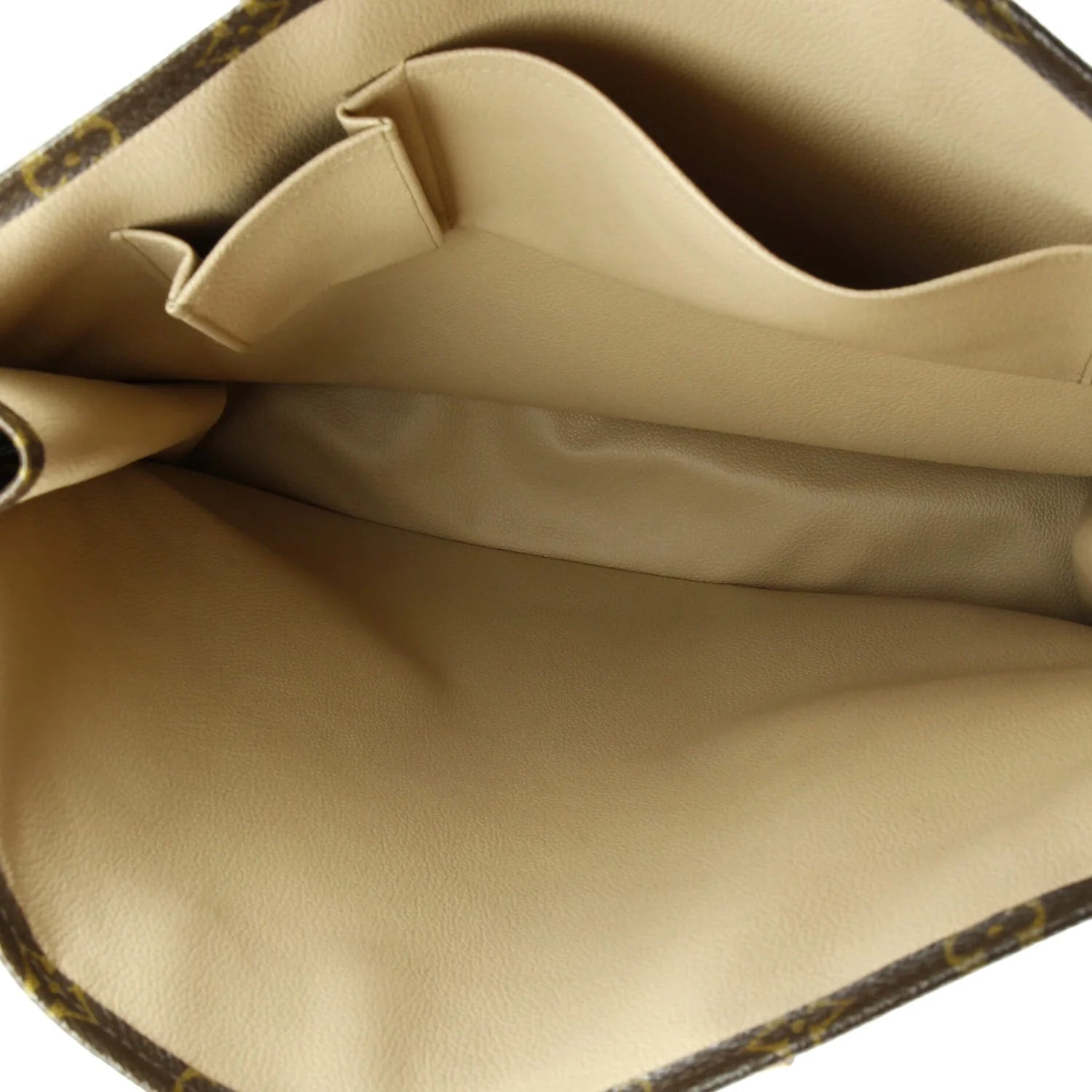 Close-up of beige leather interior with visible stitching louis vuitton sac plat 